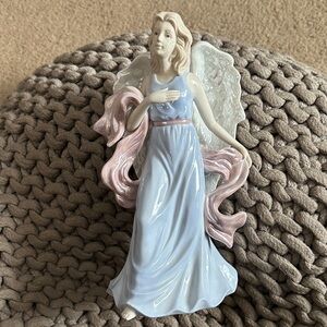 Elegant Angel Figurine with Pink and Blue Accents